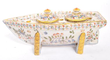 18TH CENTURY FRENCH FAIENCE INK POT STAND IN BOAT FORM