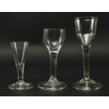 THREE 18TH CENTURY ENGLISH PLAIN STEM WINE GLASSES