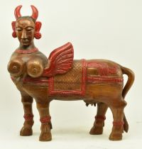 INDIAN 20TH CENTURY CARVED HARDWOOD KAMADHENU STATUE