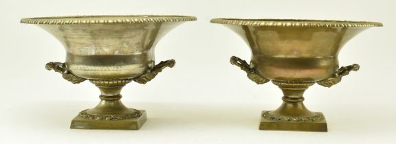 PAIR OF SILVERED METAL CLASSICAL STYLE HANDLED URNS