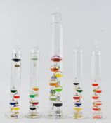 COLLECTION OF FIVE GALILEO STYLE GLASS THERMOMETERS