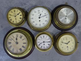 A collection of six brass-cased bulkhead clocks, (all in need of attention), (6).