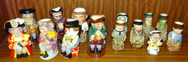 A collection of Royal Doulton small Toby jugs, including "Town Crier", "The Jester" and "The Clown",