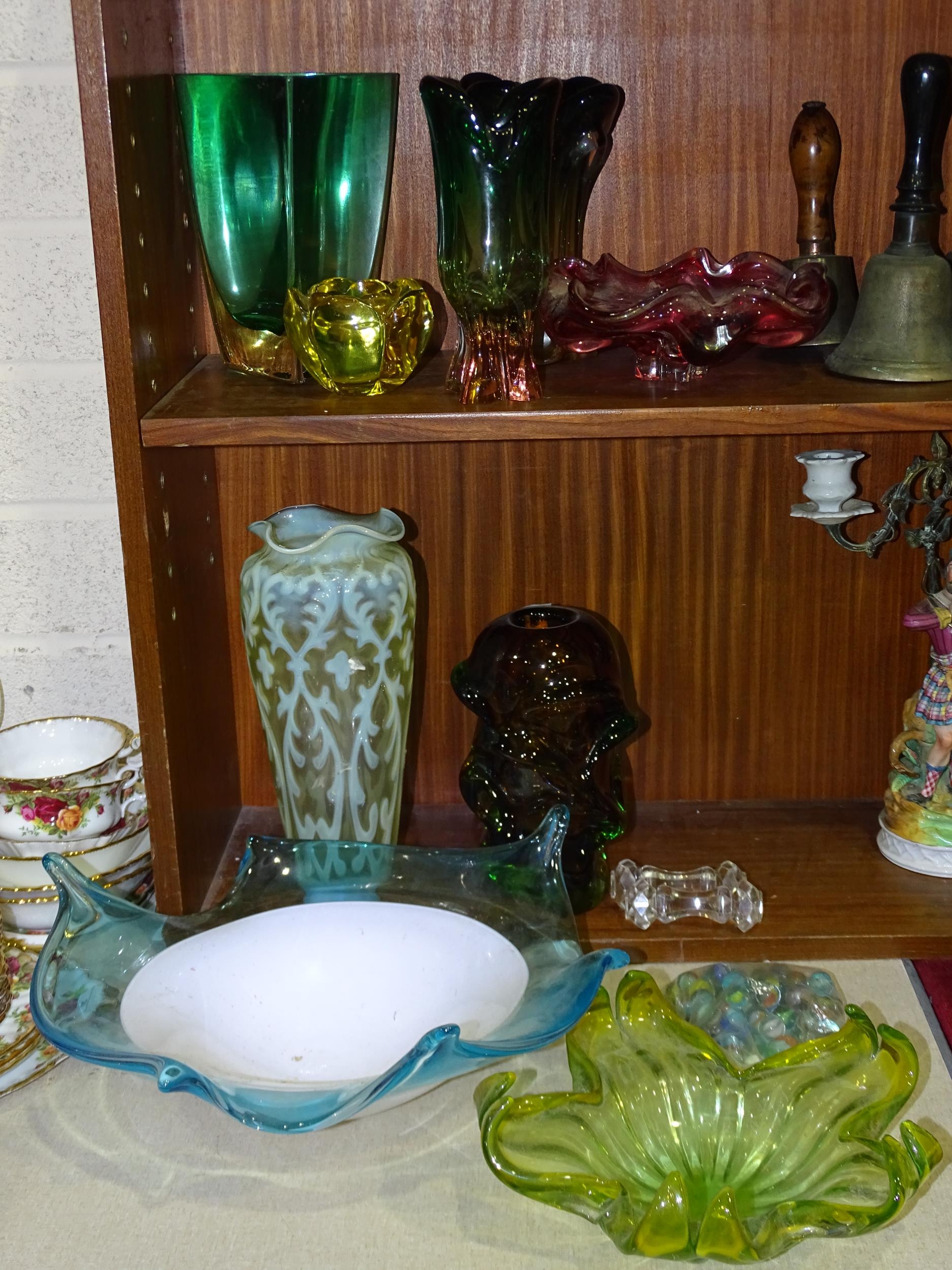 A collection of modern art glass vases and an opalescent green glass vase, 30cm high.