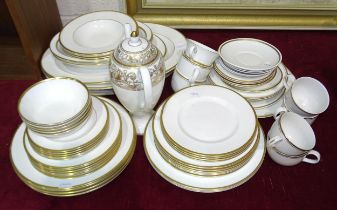 A collection of Minton, Royal Doulton and other tea ware and dinner ware, including the Golden