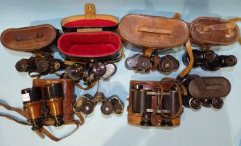 A collection of eight pairs of binoculars, including Goerz 8x Trieder, Carl Zeiss Jena Feldstecher 8