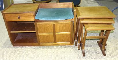 A nest of three Parker Knoll occasional tables and a mid-20th century teak telephone seat, (2).