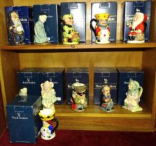 A collection of eleven Royal Doulton character jugs, including "The Spook", "The Bearded Spook", "