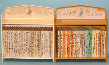 Potter (Beatrix), a set of 23 titles, all with dwrps, mainly c1960's, in Peter Rabbit's bookshelf