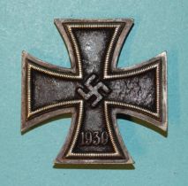 A German WWII Iron Cross, 1st Class, no maker's mark.