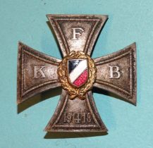 A Weimar Republic Front Fighters League Honour Cross with enamelled red, white and black central