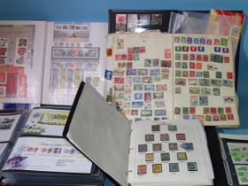 An accumulation of stamps and covers in nine albums and loose, with Great Britain mint decimal