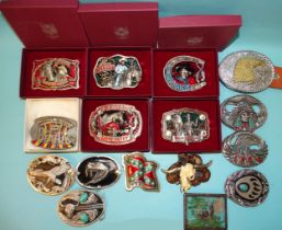 Six boxed pewter belt buckles and ten other Western-style buckles, (one with belt), (16).