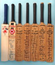 A souvenir miniature cricket bat signed by the Zimbabwe cricket team, five other Zimbabwe team