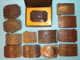 A collection of thirteen 'Western' brass belt buckles, mainly "Tiffany"-type, one "Gaylord", one