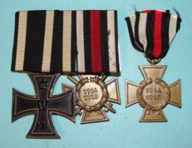 A German WWI 1914 Iron Cross (2nd Class), a 1914-18 Honour Cross with maker's mark "Erbe" and an