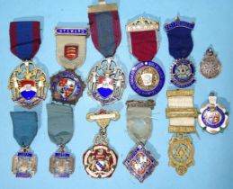 A collection of twelve Masonic and other silver charity jewels and a silver-gilt HAA chapter