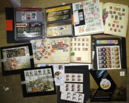 An accumulation of stamps and covers in albums and loose, with mint Great British decimal issues,