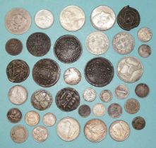 A collection of world coinage, including a Louis XIII 1631 double-tournois, a Portugal King Juan V