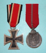A WWII Iron Cross (2nd Class) and a 1941-42 Eastern Front Medal, (2).