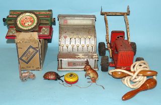 A US Zone, Germany C/W tinplate rabbit, a C/W tinplate ladybird, a Simplex toy typewriter with