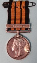 An East and West Africa Medal 1887-1900, with Benin 1897 clasp awarded to H G Emmett, CPO HMS