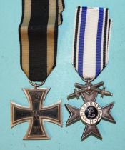 A WWI Bavarian War Merit Cross (2nd Class), marked D for Deschler and a 1914 Iron Cross (2nd Class),