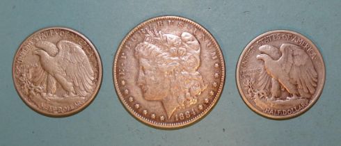 A USA 1884 silver dollar coin, two half-dollars 1934 & 1942, other coinage and a small collection of