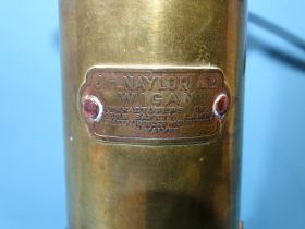 J H Naylor Ltd, Wigan, a brass and iron miner's safety lamp engraved D T Owen, 37cm high (including