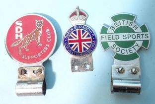 Car badges: British Field Sports Society, South Devon Hunt Supporters Club, and Queen Elizabeth