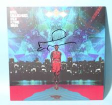 A Noel Gallagher High Flying Birds "This Is The Place" 12" coloured vinyl single signed by Noel