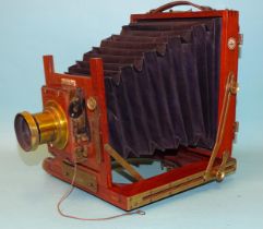 A mahogany and brass half-plate bellows camera "The Popular", B.T. Bayley, 8 Union Street,