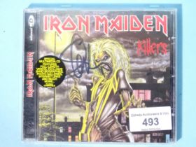 An Iron Maiden CD "Killers" signed by Steve Harris at The Cheese & Grain, Frome, Somerset, 17/01/24.