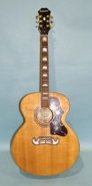 An acoustic guitar by Epiphone, model EJ-200/N, serial no.0806233940.