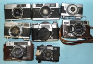 Eight various cameras by Ricoh, Konika, Fujica (a/f), nine lenses by Pentax and others and two