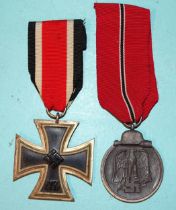 A WWII Iron Cross (2nd Class) and a 1941-42 Eastern Front Medal, (2).