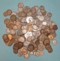 A collection of 1920-1946 silver coinage: 3d x 89, 6d x 125, 1/- x 72 and 2/- x 12, 991g (32oz).