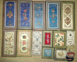 Seven Chinese embroidered silk mats, 31 x 63cm approximately and ten smaller mats, (17).