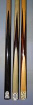 A collection of three snooker cues: a Riley Prize Cue with tombstone badge, handmade, 16½oz,