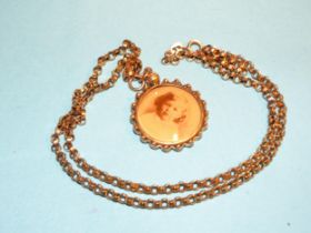 A 9ct gold belcher-link neck chain, 52cm long, with a 9ct gold double-sided locket, 27mm diameter,