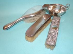 A silver sauce boat with wavy rim standing on three paw feet, 7cm high, 14.5cm wide, ___3oz, Chester