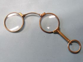 A pair of 18ct gold lorgnettes marked DIXEY, Bond Street, London, 8.5cm closed, 26.7g.