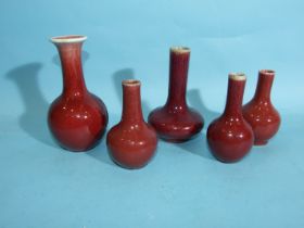 A group of five Chinese flambé-glazed small vases, Qing, largest 16cm.