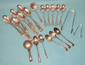 Six Georgian silver teaspoons and a pair of sugar tongs, various dates, a Victorian silver caddy