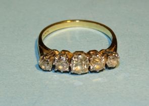A five stone diamond ring, claw set five old brilliant-cut diamonds in 18ct yellow and white gold