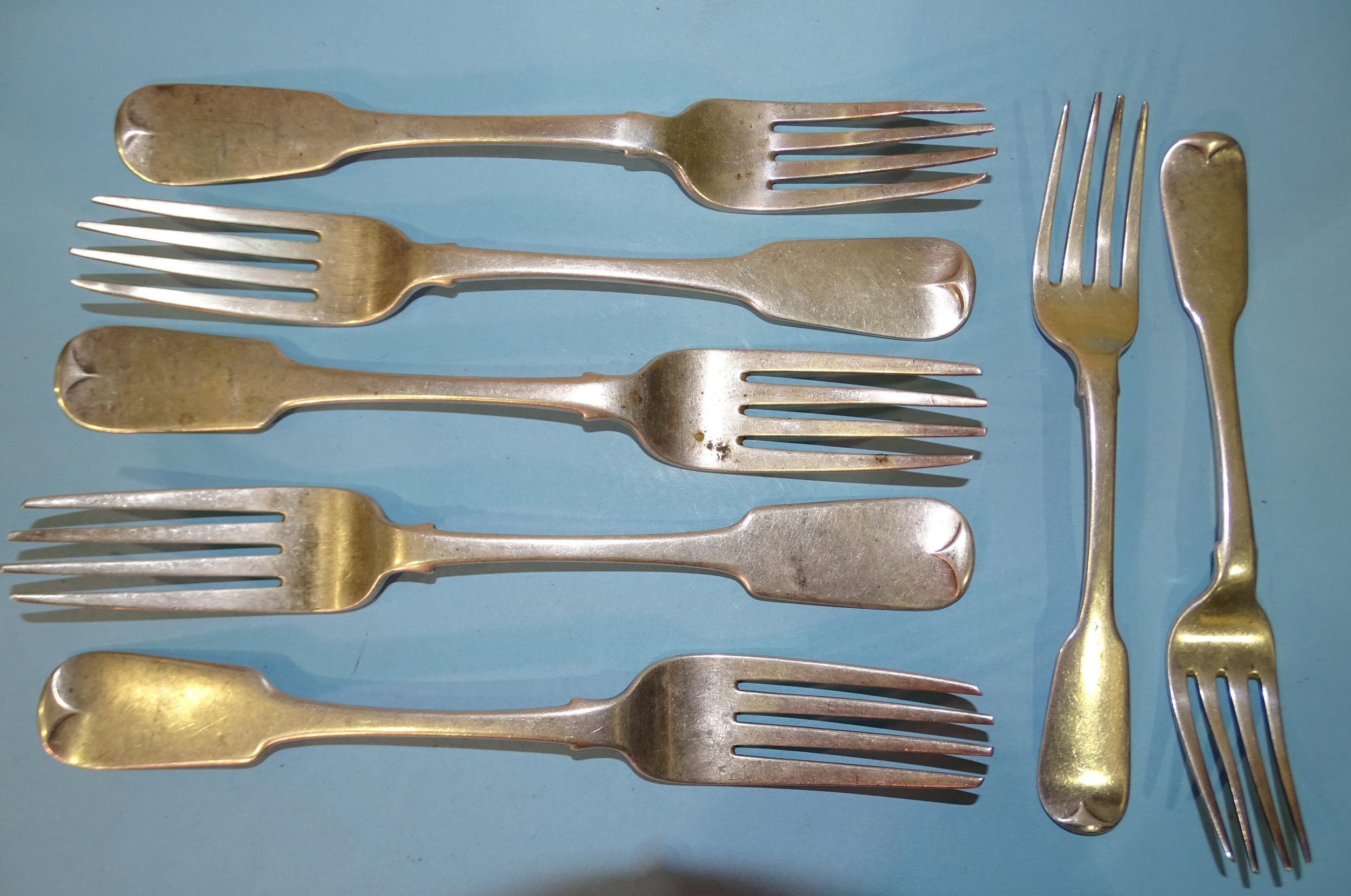 Three George IV silver fiddle pattern table forks, Dublin 1820, maker James England, stamped M West,