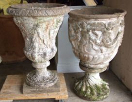 A cast concrete garden urn of campana shape decorated with classical figures, on square plinth, 81cm