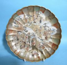 A good-quality 19th century Japanese Satsuma fluted dish decorated with samurai and geishas in