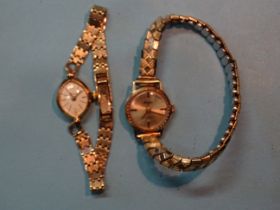 A lady's Accurist 9ct gold wrist watch on 9ct gold bracelet, 12.4g and another, similar, on plated