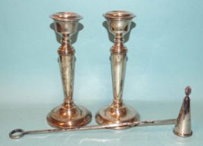 A pair of modern silver candlesticks with loaded bases, 19cm high, Birmingham 1963 and a modern